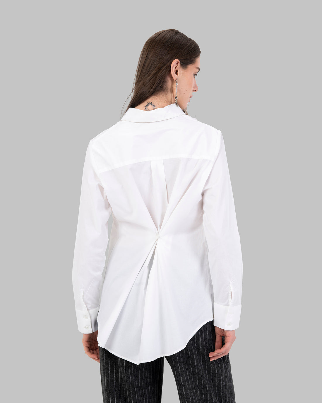 Oversize white collared shirt.