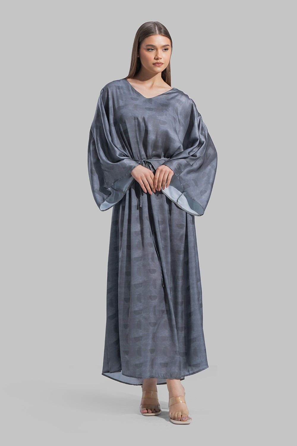 Oversized maxi dress featuring a V-neckline and wide kimono-style sleeves.