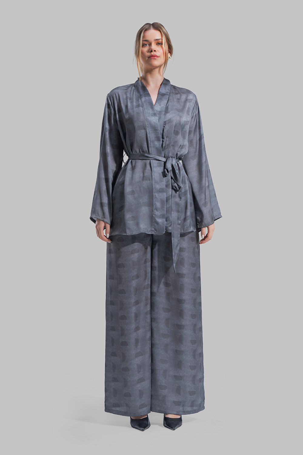 Long sleeve Cardigan with a wrap-style front.