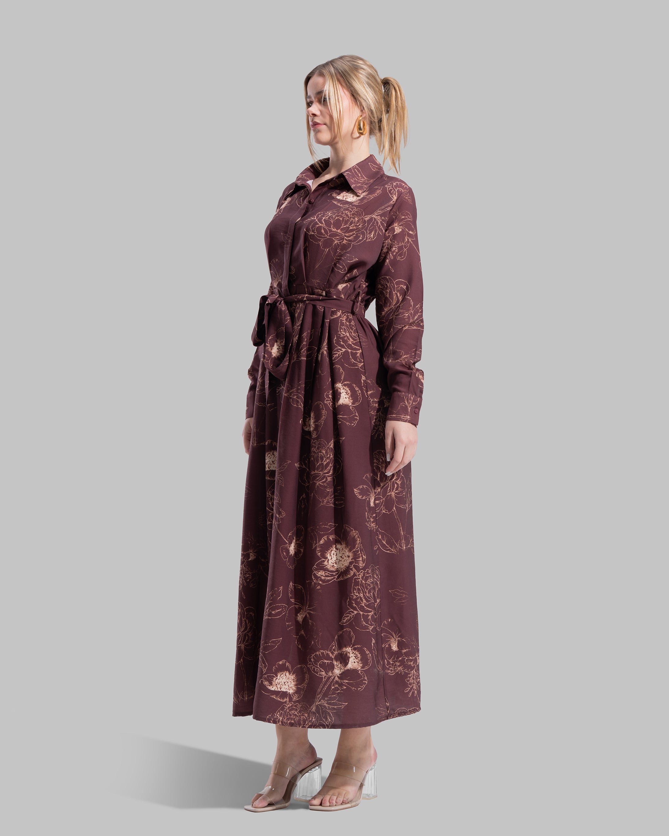 Floral print midi shirt dress with a matching tie belt at the waist.