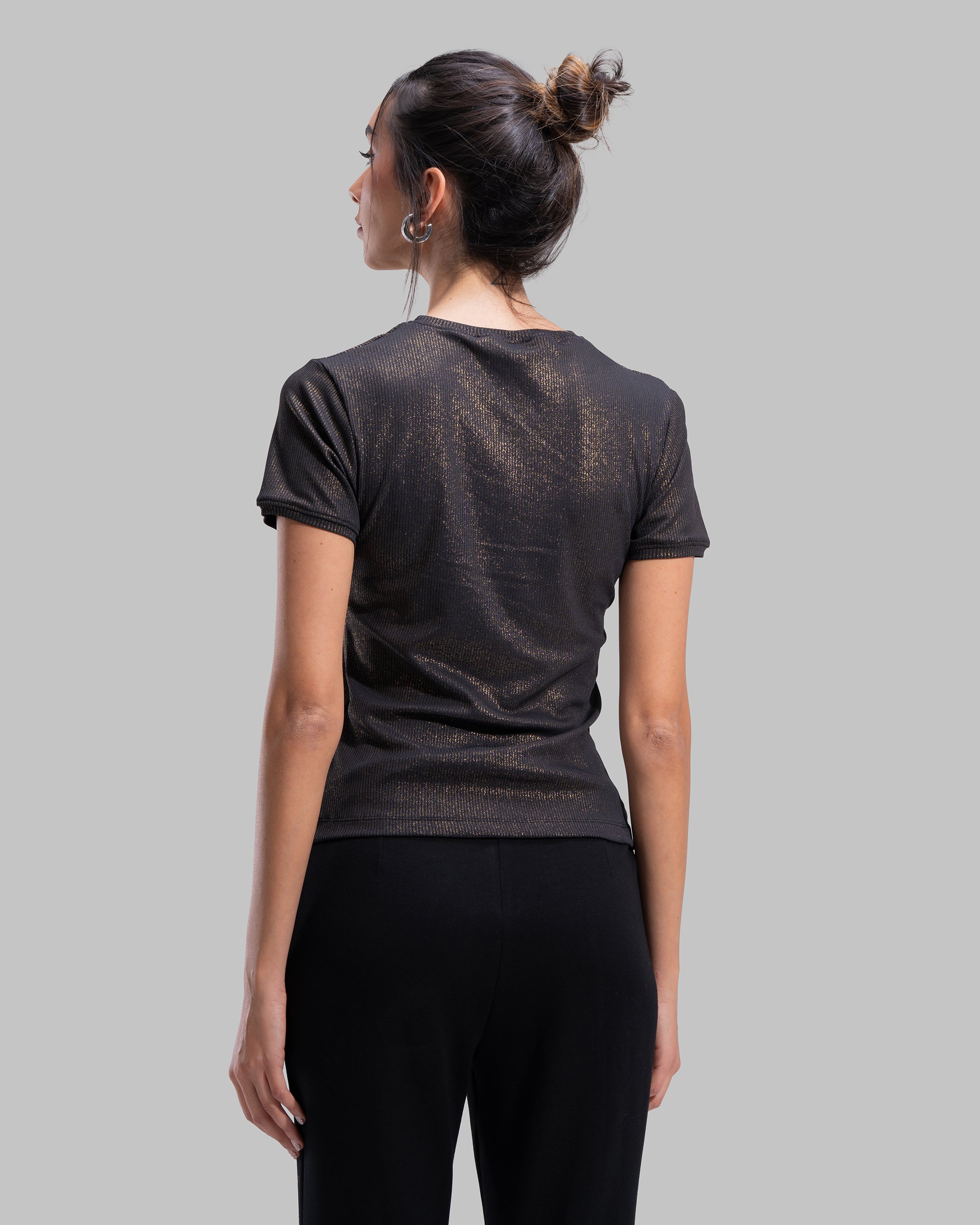 Short sleeve ribbed top with a shimmering metallic finish and round neck.