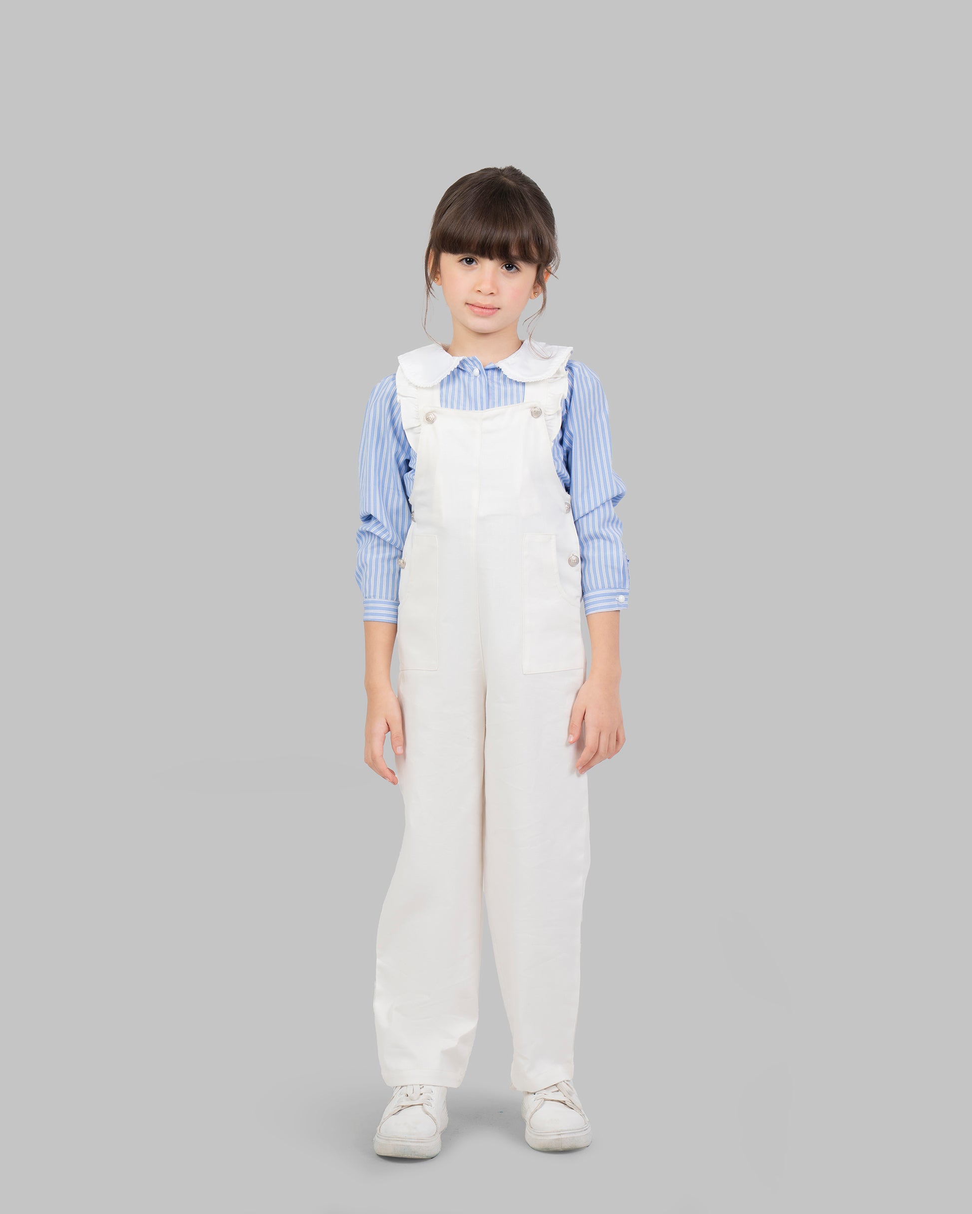 jumpsuit in flashy colors with adjustable shoulder straps and ruffle detailing.