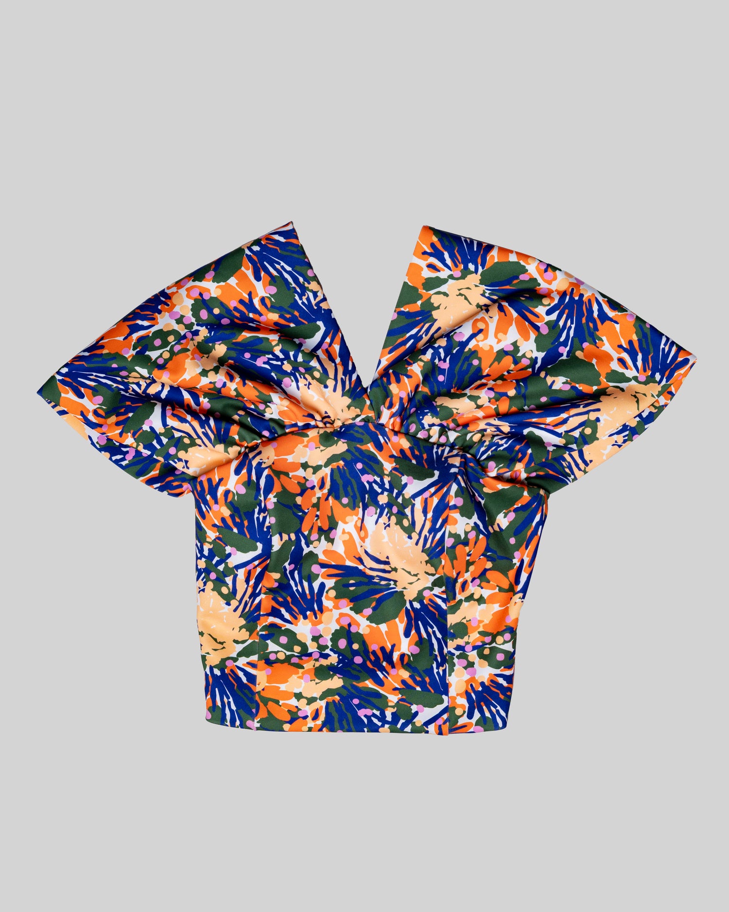 PRINTED OFF-SHOULDER TOP WITH A V-NECK. INVISIBLE BACK ZIP FASTENING
