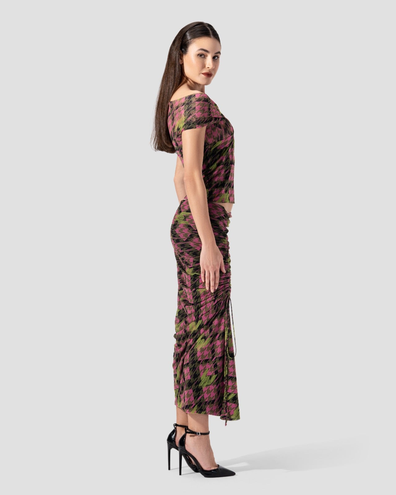 Sleeveless top with cross-over draped front