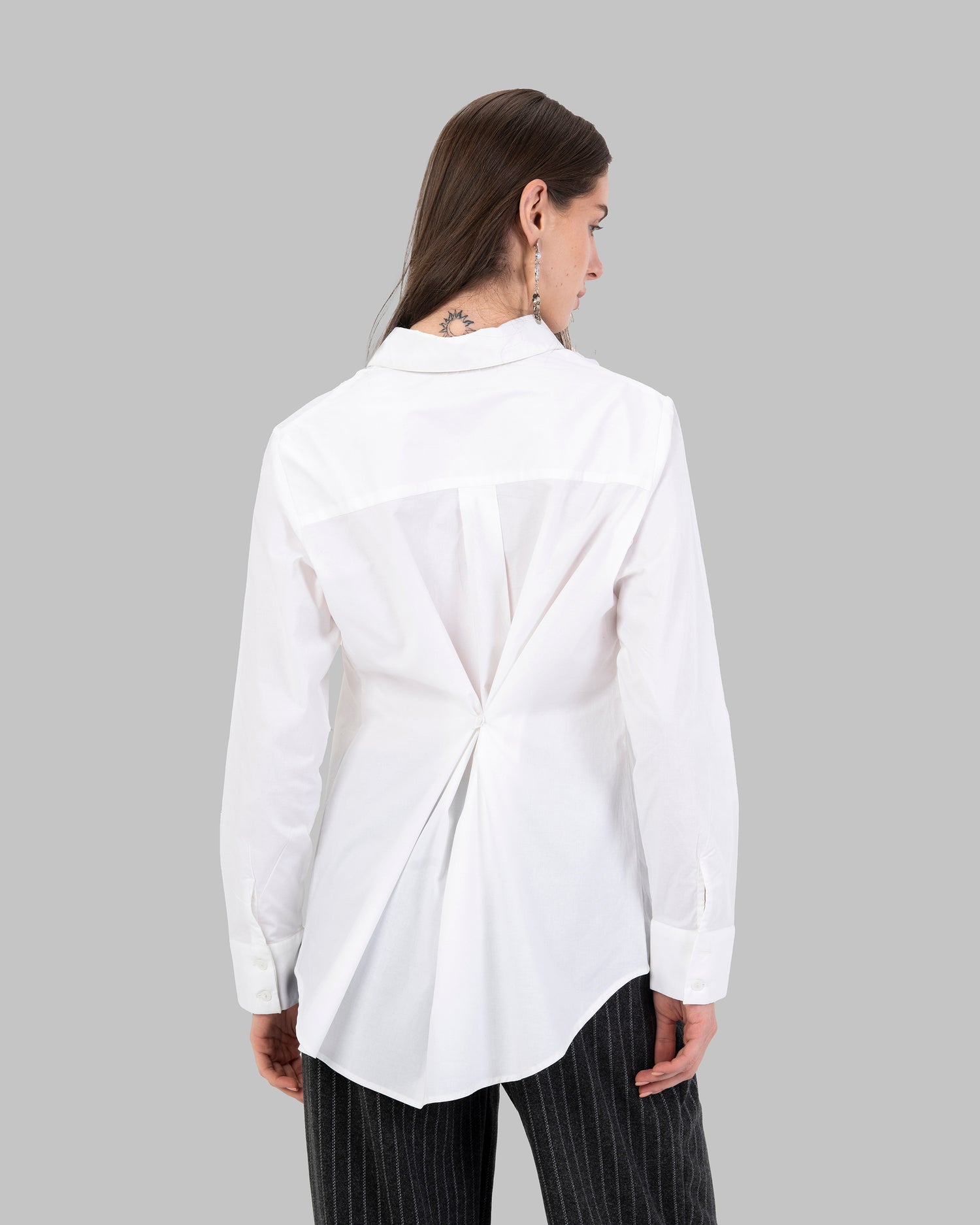 Oversize white collared shirt.