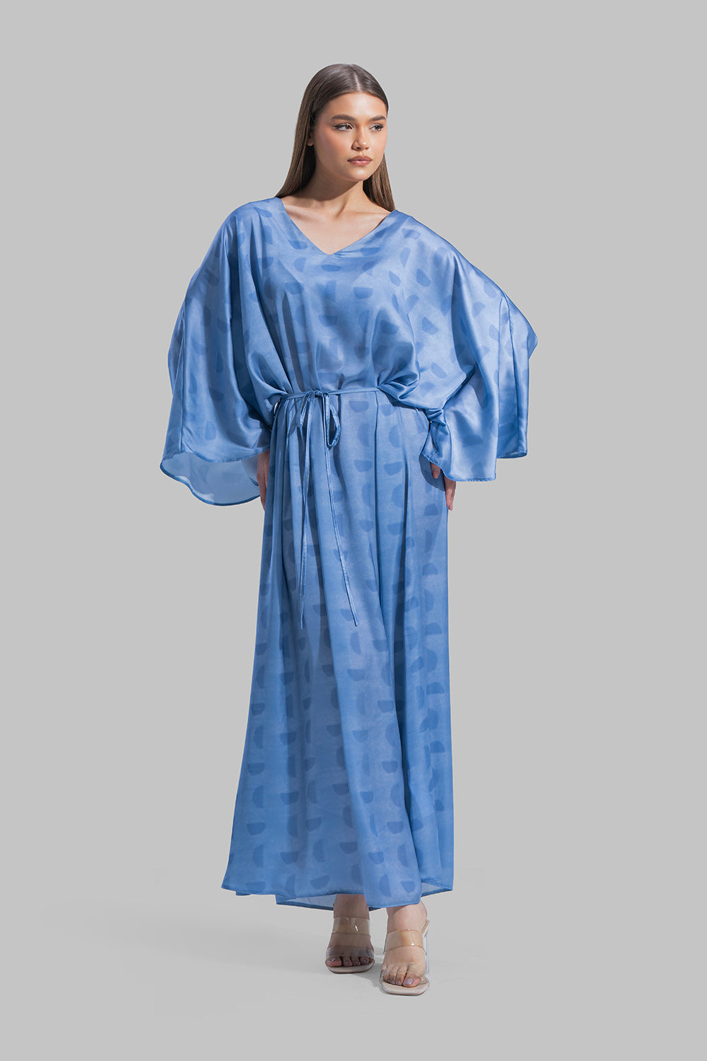 Oversized maxi dress featuring a V-neckline and wide kimono-style sleeves.