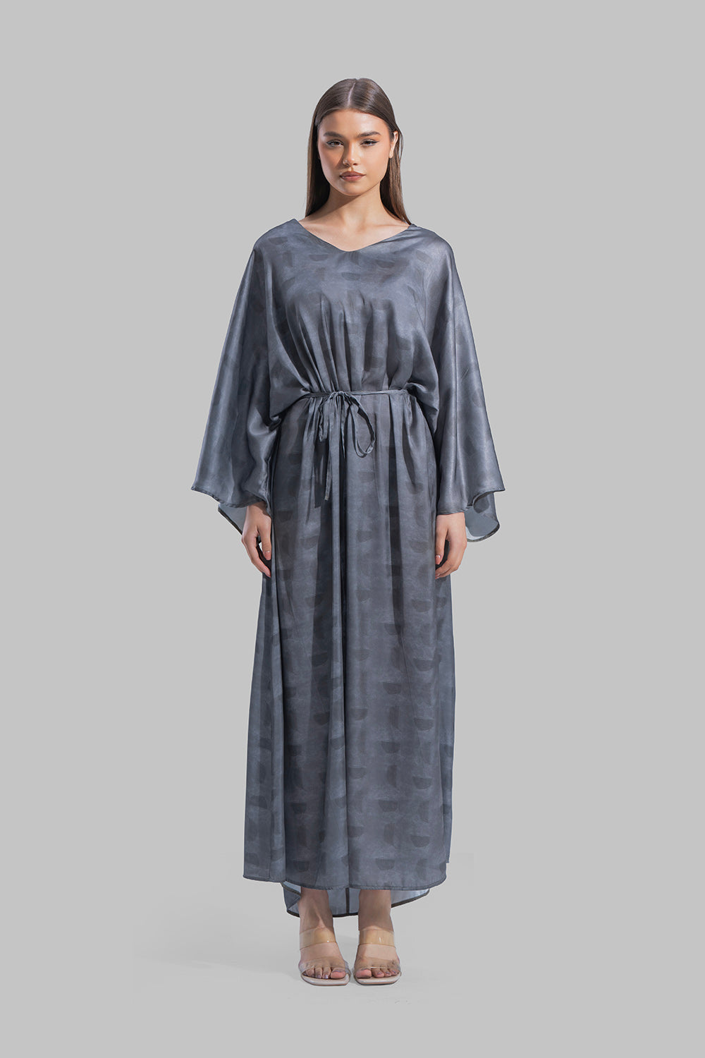 Oversized maxi dress featuring a V-neckline and wide kimono-style sleeves.