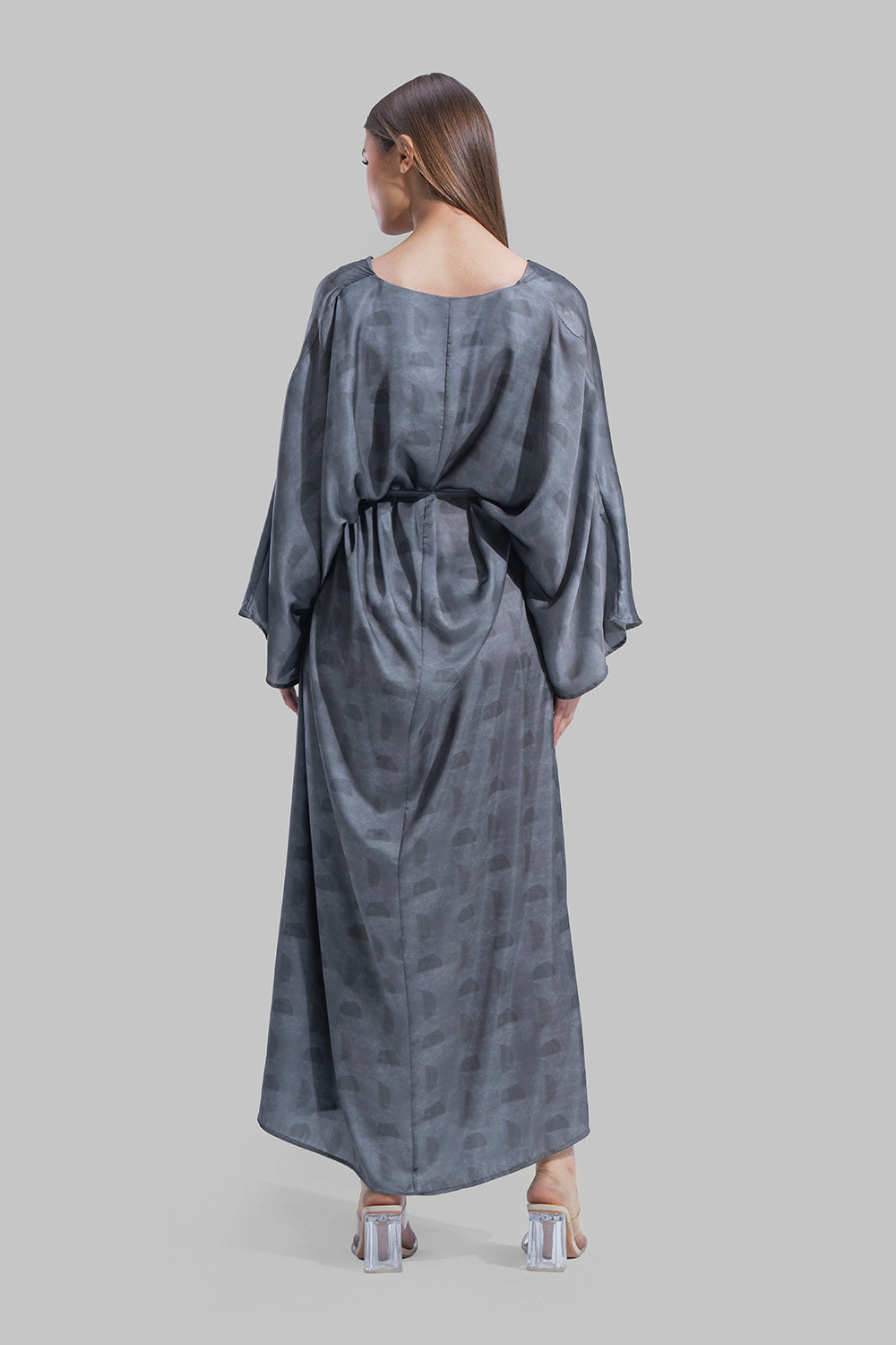 Oversized maxi dress featuring a V-neckline and wide kimono-style sleeves.