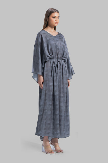 Oversized maxi dress featuring a V-neckline and wide kimono-style sleeves.