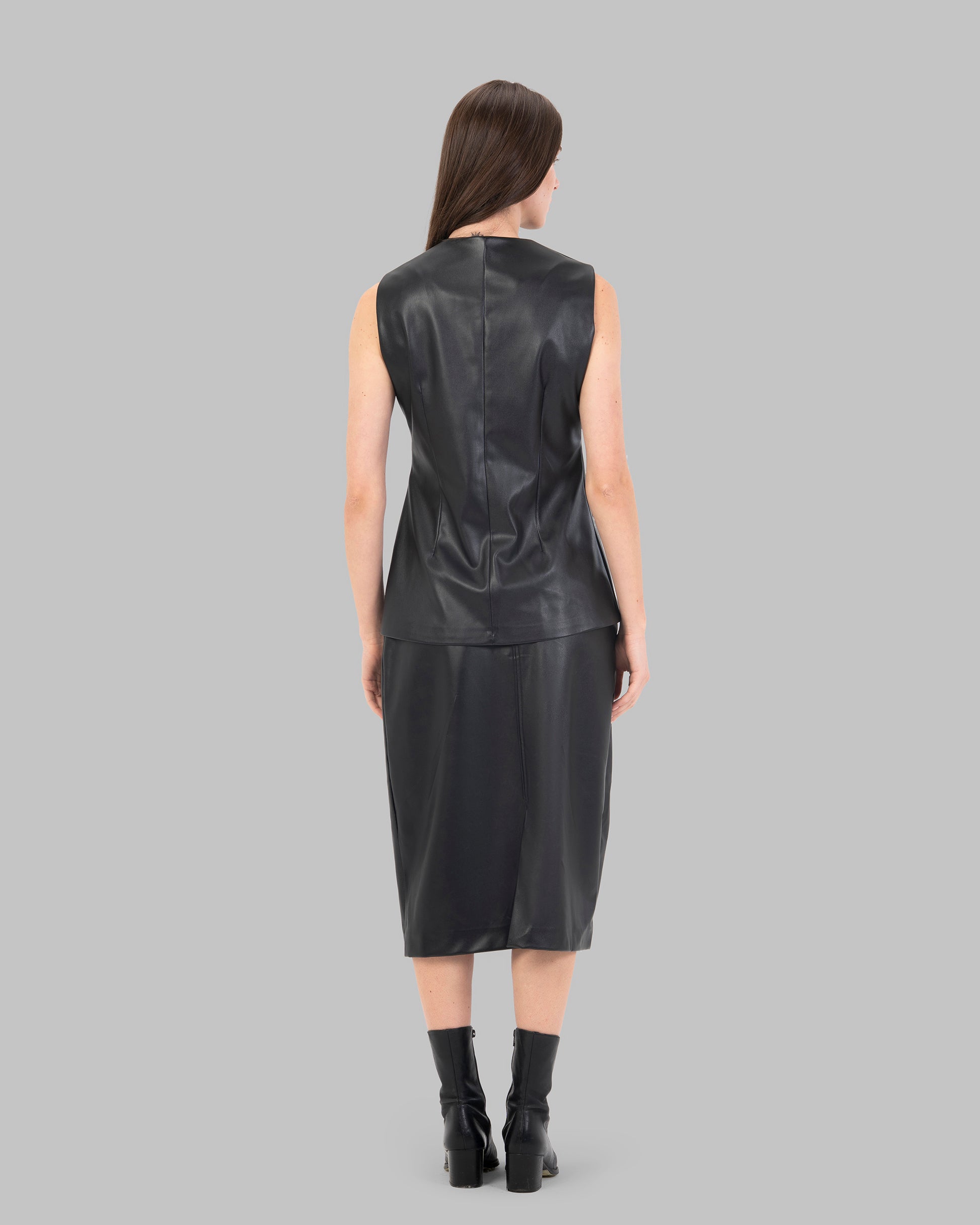 تنورة ميدي جلدية عالية الخصر