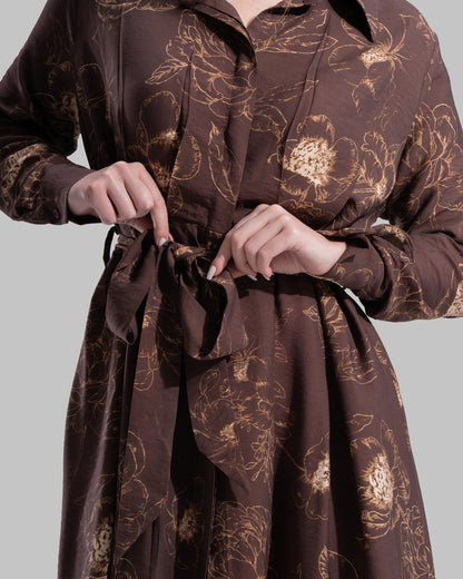 Floral print midi shirt dress with a matching tie belt at the waist.
