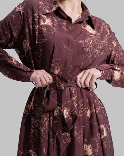 Floral print midi shirt dress with a matching tie belt at the waist.