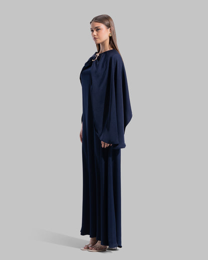 Long dress made of a flowing satin-finish fabric.