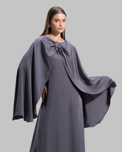 Long dress made of a flowing satin-finish fabric.