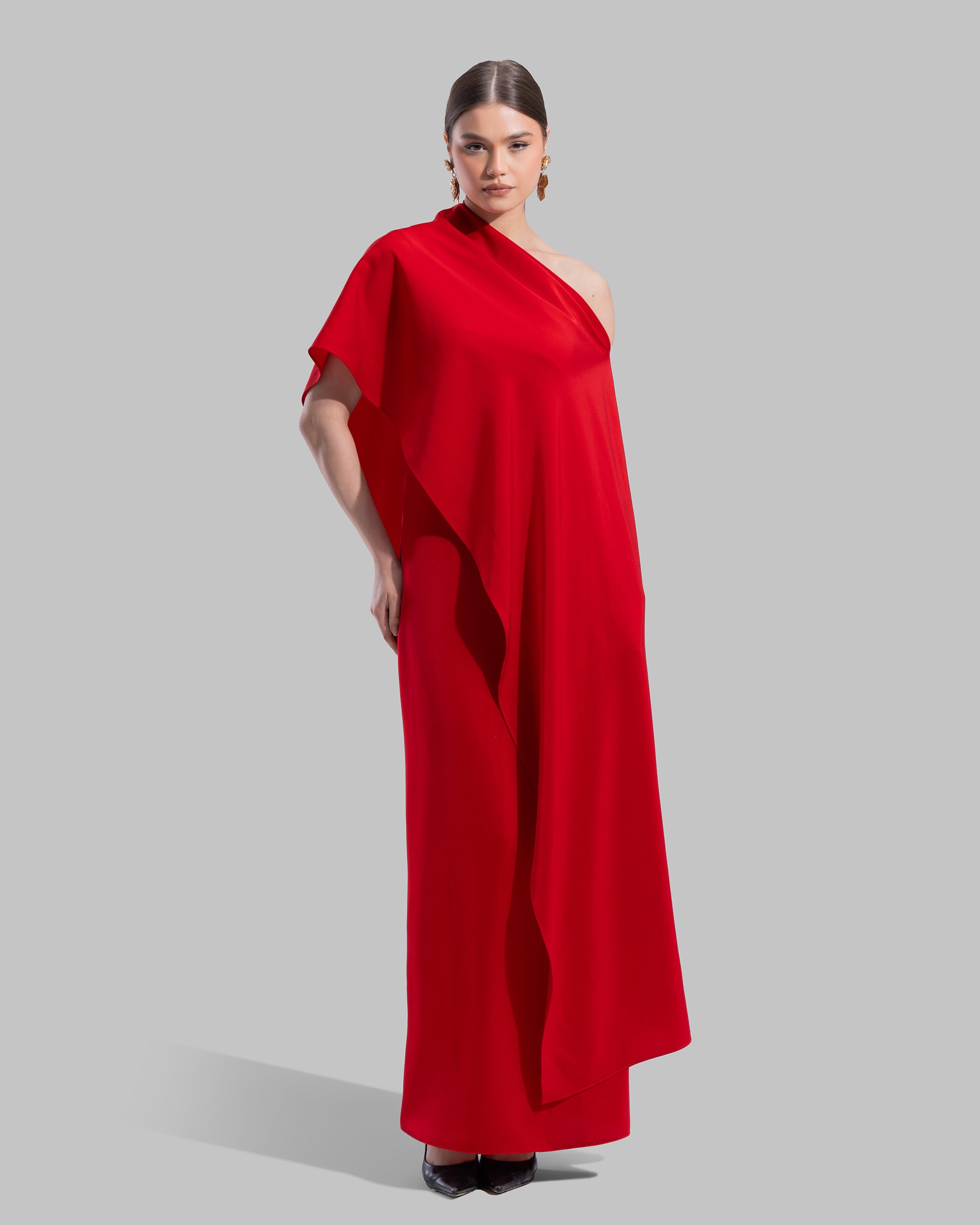 Draped asymmetrical neckline satin maxi dress with a fluid oversized silhouette.