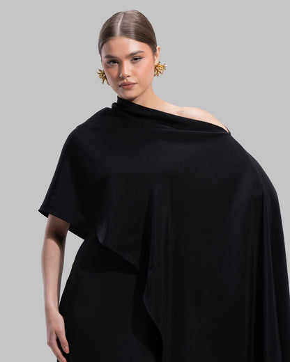 Draped asymmetrical neckline satin maxi dress with a fluid oversized silhouette.