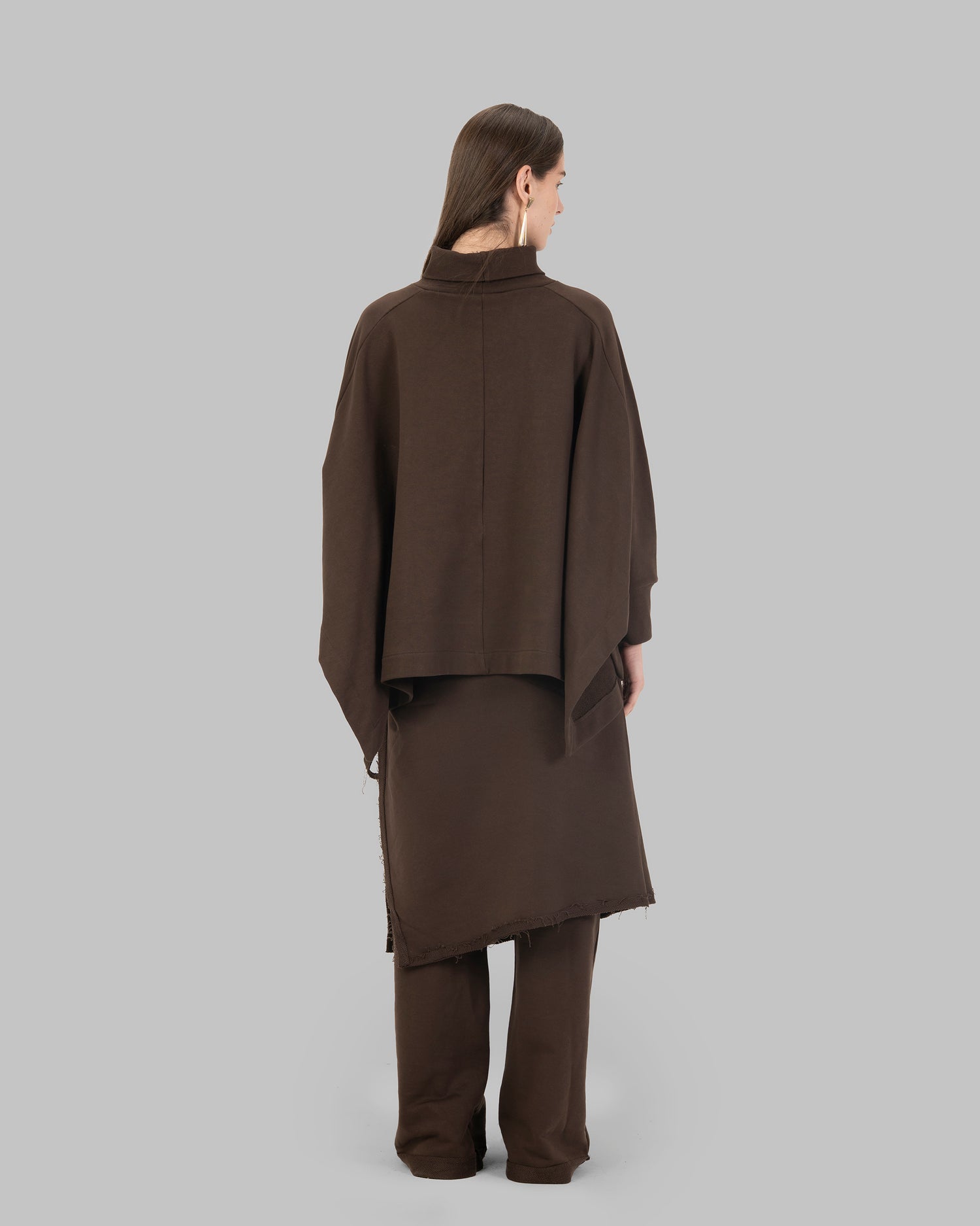 Wide-leg pants with an attached wrap-over skirt panel.