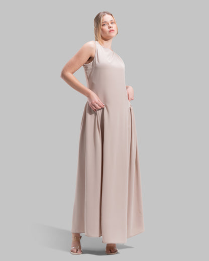 Sleeveless long dress with a round neckline.