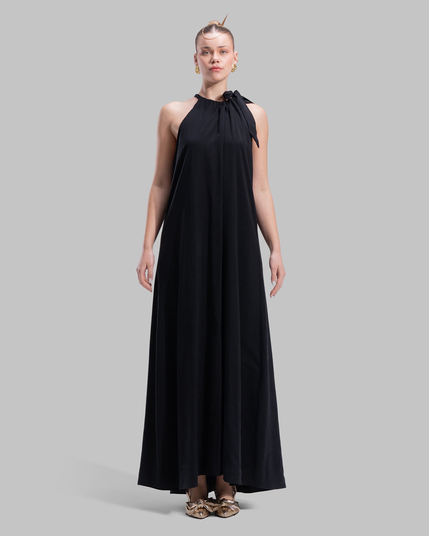 Long dress with a halter neckline.
