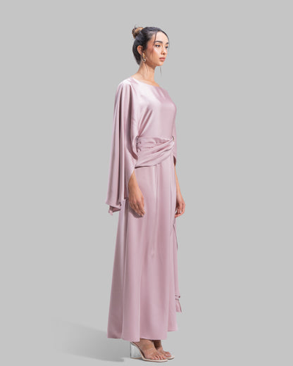 An elegant satin gown of sweeping length