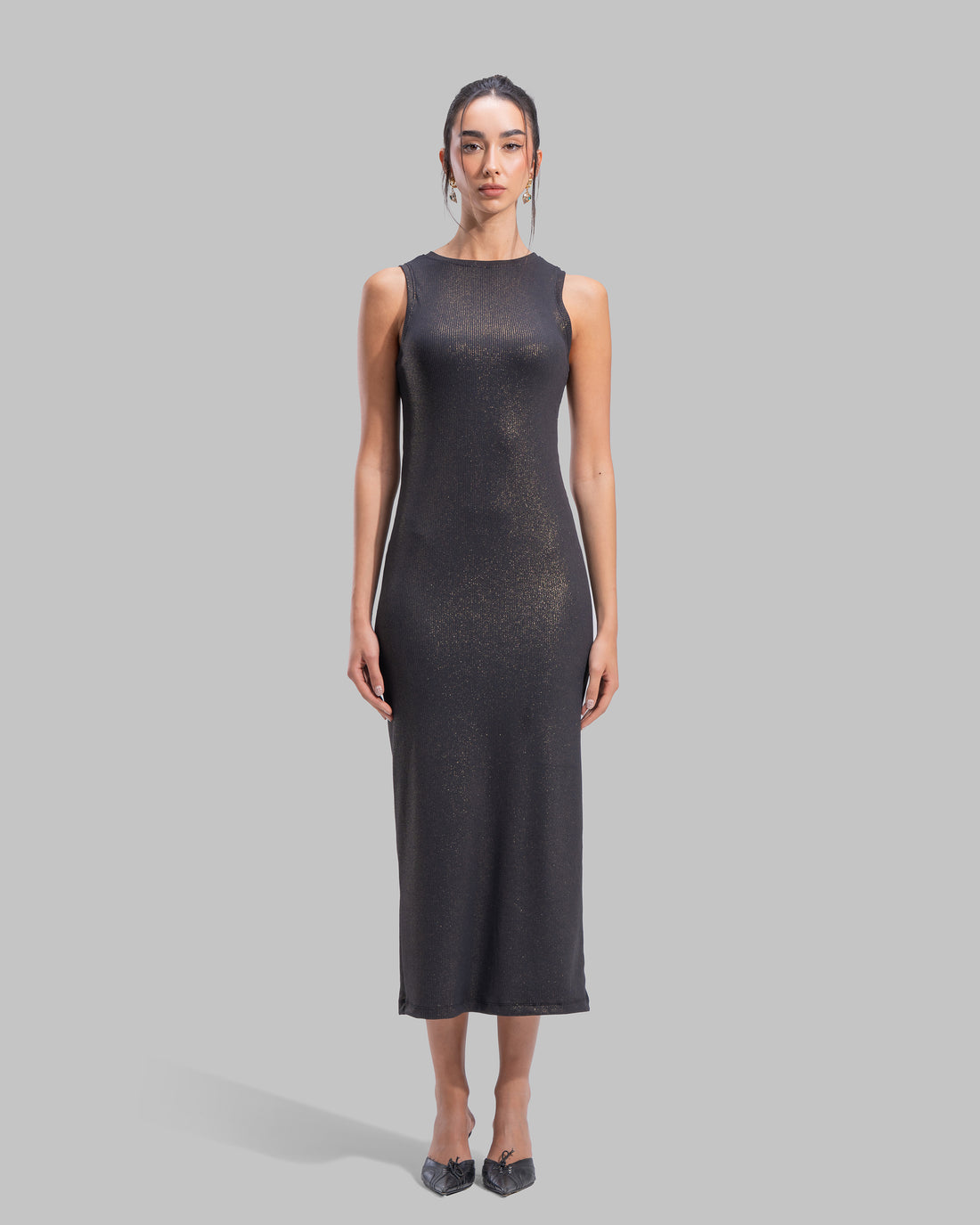 Sleeveless ribbed maxi dress with a round neckline and a tight-fit silhouette.
