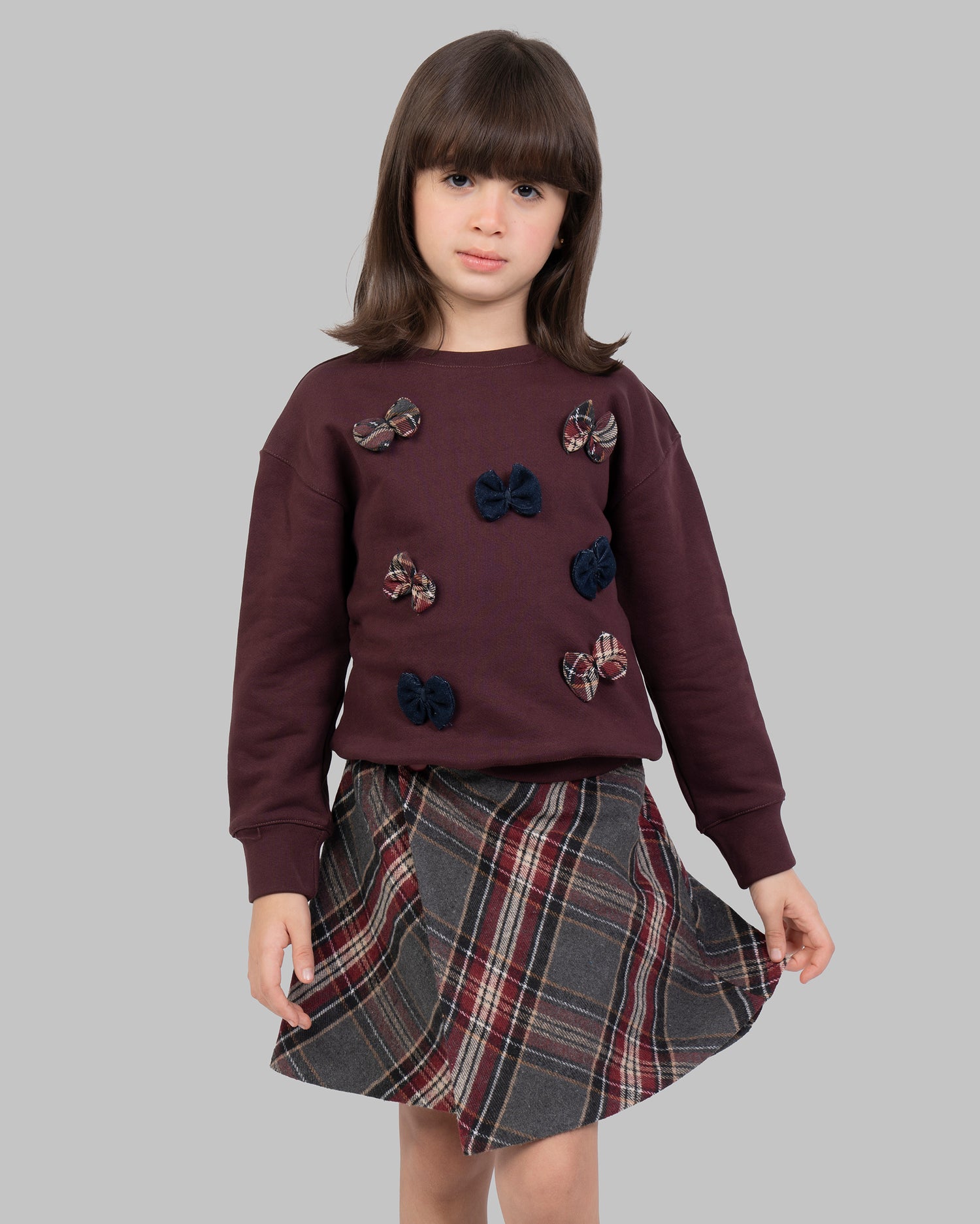 تنورة قصيرة ملفوفة من قماش كاروهات من مزيج الصوف