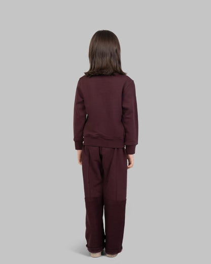 sweatshirt with small, scattered gold flowers on the front.