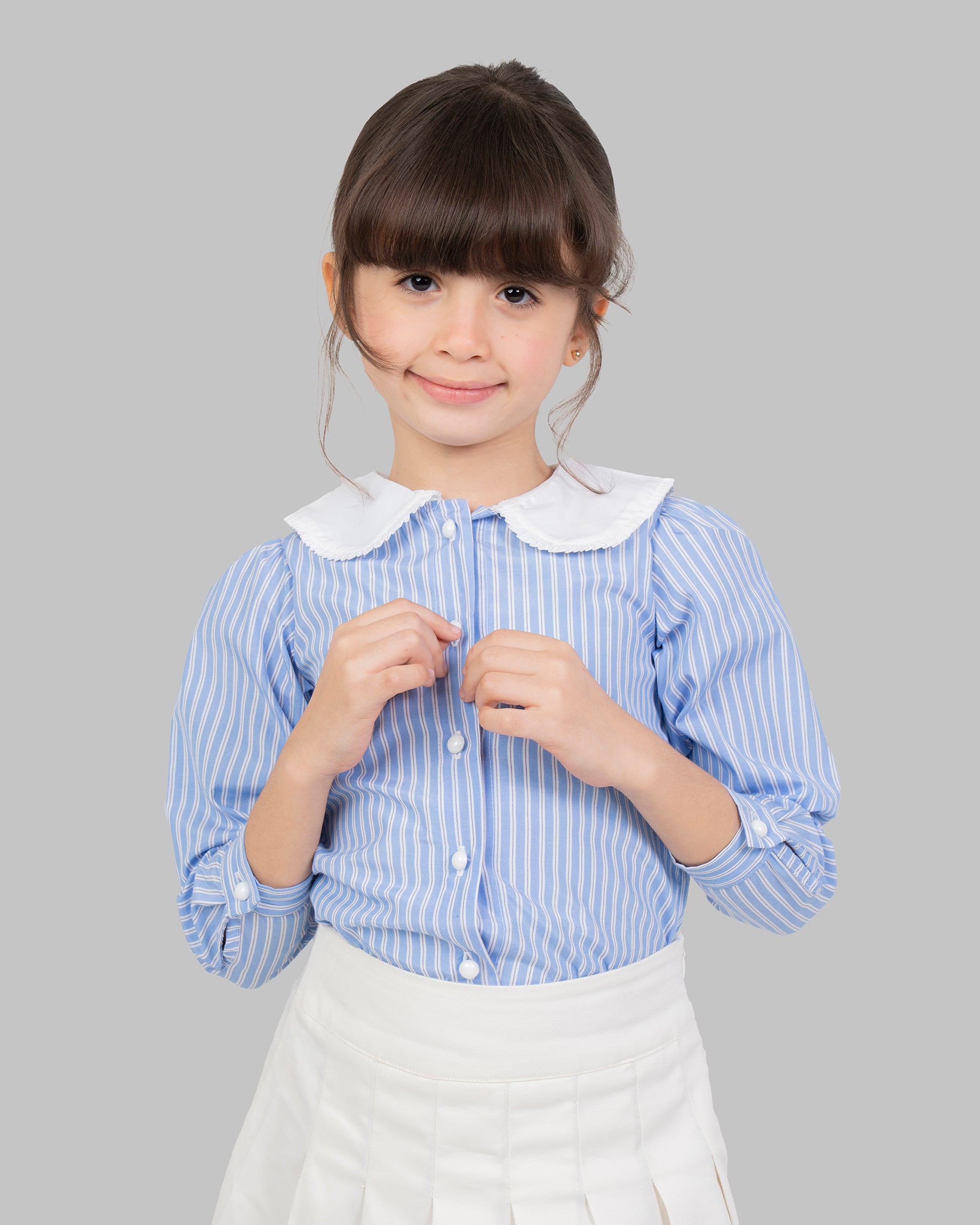 بلوزة قطنية مخططة باللون الأزرق الفاتح