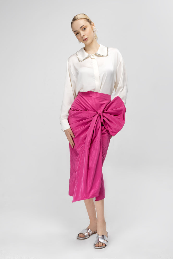 Cross skirt with bow detail